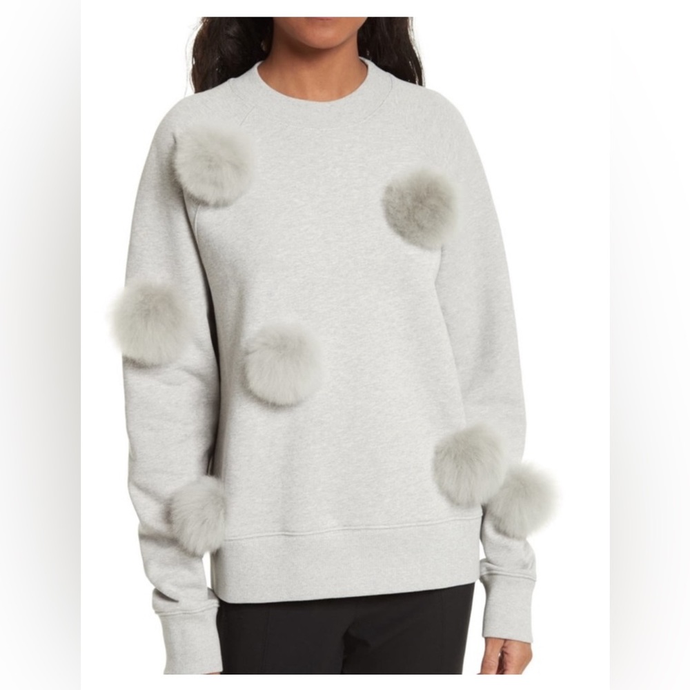 Tibi grey sweatshirt with fur pom poms